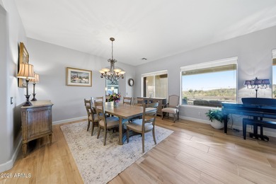 Experience elevated desert living in this exceptional TW Lewis on Estrella Mountain Ranch Golf Course in Arizona - for sale on GolfHomes.com, golf home, golf lot