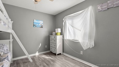 Welcome home to the Osage Vista's community. This top floor unit on Seasons Ridge At Four Seasons in Missouri - for sale on GolfHomes.com, golf home, golf lot