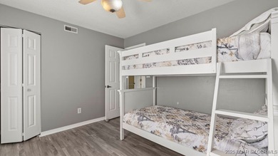 Welcome home to the Osage Vista's community. This top floor unit on Seasons Ridge At Four Seasons in Missouri - for sale on GolfHomes.com, golf home, golf lot