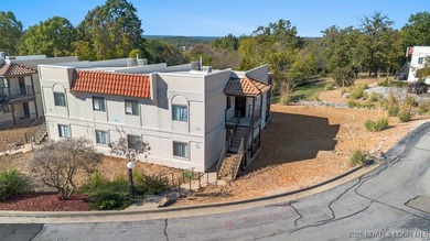 Welcome home to the Osage Vista's community. This top floor unit on Seasons Ridge At Four Seasons in Missouri - for sale on GolfHomes.com, golf home, golf lot