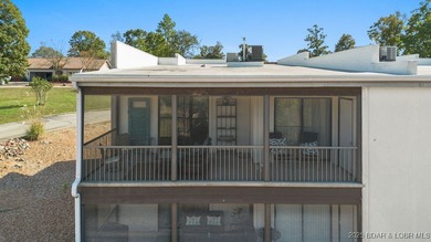 Welcome home to the Osage Vista's community. This top floor unit on Seasons Ridge At Four Seasons in Missouri - for sale on GolfHomes.com, golf home, golf lot