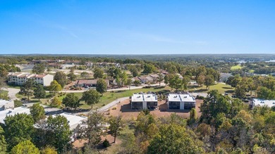 Welcome home to the Osage Vista's community. This top floor unit on Seasons Ridge At Four Seasons in Missouri - for sale on GolfHomes.com, golf home, golf lot