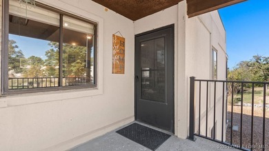 Welcome home to the Osage Vista's community. This top floor unit on Seasons Ridge At Four Seasons in Missouri - for sale on GolfHomes.com, golf home, golf lot