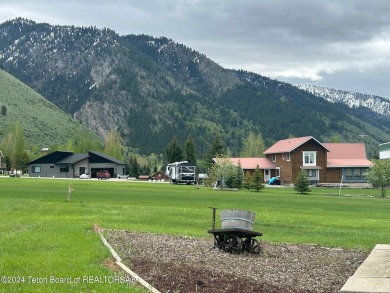 Beautifully landscaped, one-level Golf Course Home in Star on Cedar Creek Golf Course in Wyoming - for sale on GolfHomes.com, golf home, golf lot