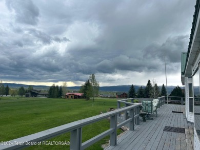 Beautifully landscaped, one-level Golf Course Home in Star on Cedar Creek Golf Course in Wyoming - for sale on GolfHomes.com, golf home, golf lot