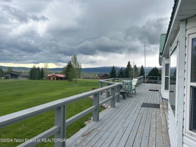 Beautifully landscaped, one-level Golf Course Home in Star on Cedar Creek Golf Course in Wyoming - for sale on GolfHomes.com, golf home, golf lot