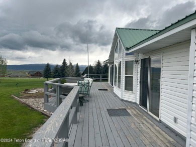 Beautifully landscaped, one-level Golf Course Home in Star on Cedar Creek Golf Course in Wyoming - for sale on GolfHomes.com, golf home, golf lot