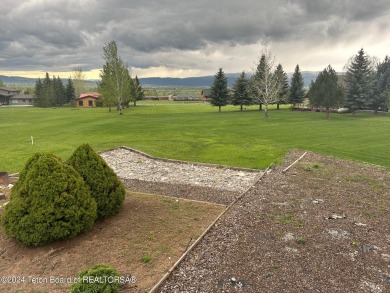 Beautifully landscaped, one-level Golf Course Home in Star on Cedar Creek Golf Course in Wyoming - for sale on GolfHomes.com, golf home, golf lot