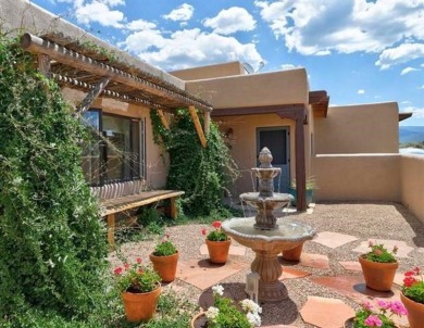 A BREATH OF FRESH AIR.   Tired of *ho-hum* cookie cutter houses? on Taos Country Club in New Mexico - for sale on GolfHomes.com, golf home, golf lot