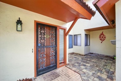 Live the golf course lifestyle! This stunning 3BR/2.5BA townhome on The Grand Club - Pine Lakes Course in Florida - for sale on GolfHomes.com, golf home, golf lot