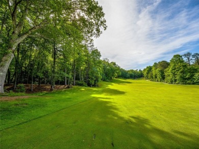 Located off Cherokee Point, this private .915-acre homesite on Lake Toxaway Country Club in North Carolina - for sale on GolfHomes.com, golf home, golf lot
