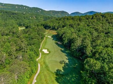 Located off Cherokee Point, this private .915-acre homesite on Lake Toxaway Country Club in North Carolina - for sale on GolfHomes.com, golf home, golf lot