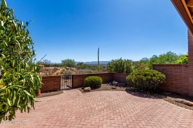 Spacious open-concept living area with stunning mountain views on Canoa Hills Golf Course in Arizona - for sale on GolfHomes.com, golf home, golf lot
