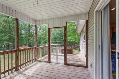 Nestled in the desirable Lake Tansi Village community of on Lake Tansi Village Country Club in Tennessee - for sale on GolfHomes.com, golf home, golf lot