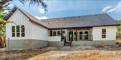 Imagine yourself in this custom built new home with golf course on Sea Trail Golf Resort in North Carolina - for sale on GolfHomes.com, golf home, golf lot