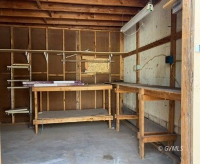 This fully updated, 3-bedroom 2 bath home is move-in ready and on Mt. Graham Municipal Golf Course in Arizona - for sale on GolfHomes.com, golf home, golf lot