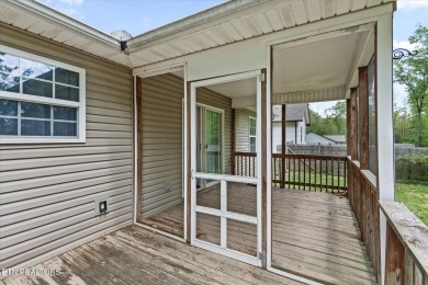 Nestled in the desirable Lake Tansi Village community of on Lake Tansi Village Country Club in Tennessee - for sale on GolfHomes.com, golf home, golf lot