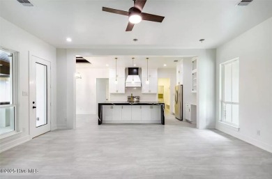 Imagine yourself in this custom built new home with golf course on Sea Trail Golf Resort in North Carolina - for sale on GolfHomes.com, golf home, golf lot