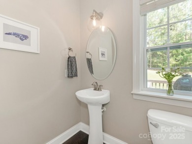 Impeccable 4BR, 2.5BA home in the Palisades. W/ timeless curb on The Palisades Country Club in North Carolina - for sale on GolfHomes.com, golf home, golf lot