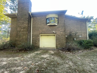 Golf-front brick beauty on a shaded double lot in Indian Hills on Indian Hills Country Club in Arkansas - for sale on GolfHomes.com, golf home, golf lot