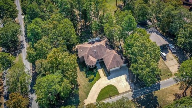 Golf-front brick beauty on a shaded double lot in Indian Hills on Indian Hills Country Club in Arkansas - for sale on GolfHomes.com, golf home, golf lot
