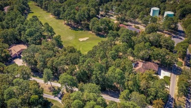 Golf-front brick beauty on a shaded double lot in Indian Hills on Indian Hills Country Club in Arkansas - for sale on GolfHomes.com, golf home, golf lot