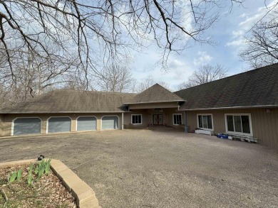 Welcome to a truly one-of-a-kind contemporary retreat tucked on The Eagle Pointe Golf Resort in Indiana - for sale on GolfHomes.com, golf home, golf lot