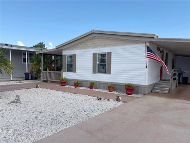 This beautifully updated home in the 55+ waterfront community of on Apollo Beach Golf and Sea Club in Florida - for sale on GolfHomes.com, golf home, golf lot