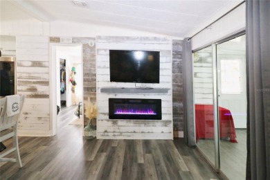 This beautifully updated home in the 55+ waterfront community of on Apollo Beach Golf and Sea Club in Florida - for sale on GolfHomes.com, golf home, golf lot