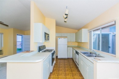 Charming Single-Level Home with Endless Potential - Discover a on Coral Creek Golf Course in Hawaii - for sale on GolfHomes.com, golf home, golf lot