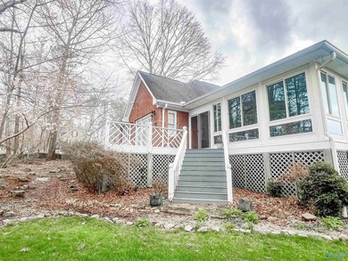SOMETHING SPECIAL ABOUT THIS ONE. As you enter the well managed on Cherokee Ridge Country Club in Alabama - for sale on GolfHomes.com, golf home, golf lot