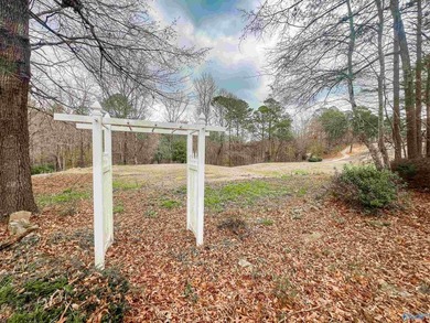 SOMETHING SPECIAL ABOUT THIS ONE. As you enter the well managed on Cherokee Ridge Country Club in Alabama - for sale on GolfHomes.com, golf home, golf lot