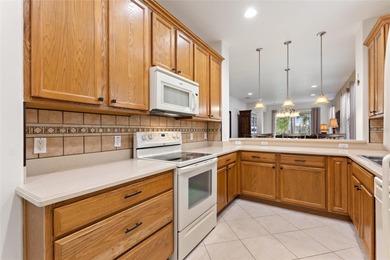 Looking for a beautiful low maintenance home sitting in an ideal on Stonegate Golf Club in Florida - for sale on GolfHomes.com, golf home, golf lot