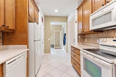 Looking for a beautiful low maintenance home sitting in an ideal on Stonegate Golf Club in Florida - for sale on GolfHomes.com, golf home, golf lot