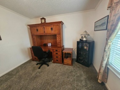 This home is on leased land, meaning buyers do not own the land on Big Cypress Golf and Country Club in Florida - for sale on GolfHomes.com, golf home, golf lot