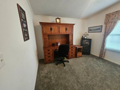This home is on leased land, meaning buyers do not own the land on Big Cypress Golf and Country Club in Florida - for sale on GolfHomes.com, golf home, golf lot