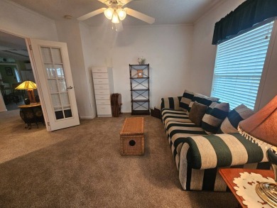 This home is on leased land, meaning buyers do not own the land on Big Cypress Golf and Country Club in Florida - for sale on GolfHomes.com, golf home, golf lot