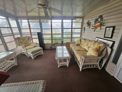 This home is on leased land, meaning buyers do not own the land on Big Cypress Golf and Country Club in Florida - for sale on GolfHomes.com, golf home, golf lot