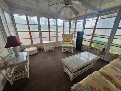 This home is on leased land, meaning buyers do not own the land on Big Cypress Golf and Country Club in Florida - for sale on GolfHomes.com, golf home, golf lot