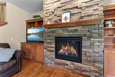 Stunning custom-built 2-story home nestled on the 13th hole of on Riverwood National in Minnesota - for sale on GolfHomes.com, golf home, golf lot