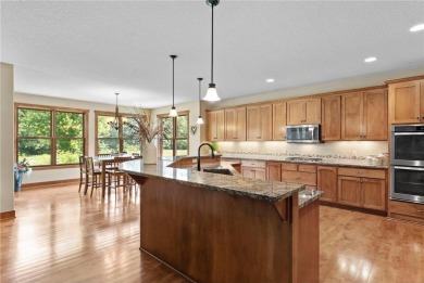 Stunning custom-built 2-story home nestled on the 13th hole of on Riverwood National in Minnesota - for sale on GolfHomes.com, golf home, golf lot