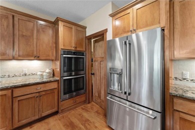 Stunning custom-built 2-story home nestled on the 13th hole of on Riverwood National in Minnesota - for sale on GolfHomes.com, golf home, golf lot
