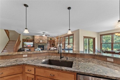 Stunning custom-built 2-story home nestled on the 13th hole of on Riverwood National in Minnesota - for sale on GolfHomes.com, golf home, golf lot