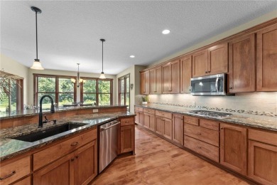 Stunning custom-built 2-story home nestled on the 13th hole of on Riverwood National in Minnesota - for sale on GolfHomes.com, golf home, golf lot