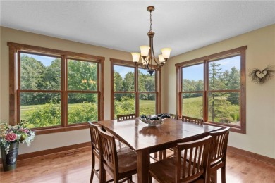 Stunning custom-built 2-story home nestled on the 13th hole of on Riverwood National in Minnesota - for sale on GolfHomes.com, golf home, golf lot