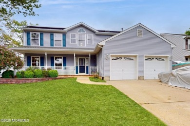 Welcome to this stunning 4-bedroom, 2.5-bath Colonial nestled in on Ocean Acres Country Club in New Jersey - for sale on GolfHomes.com, golf home, golf lot