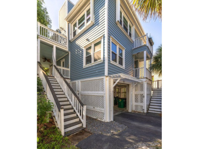 Just bring your suitcase - this turnkey home is tucked away in a on Wild Dunes Harbor Golf Resort in South Carolina - for sale on GolfHomes.com, golf home, golf lot