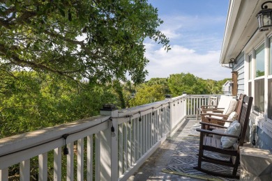 Just bring your suitcase - this turnkey home is tucked away in a on Wild Dunes Harbor Golf Resort in South Carolina - for sale on GolfHomes.com, golf home, golf lot