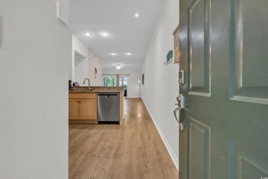 Enjoy easy coastal living in this beautifully updated 2-bedroom on Indian Wells Golf Course in South Carolina - for sale on GolfHomes.com, golf home, golf lot