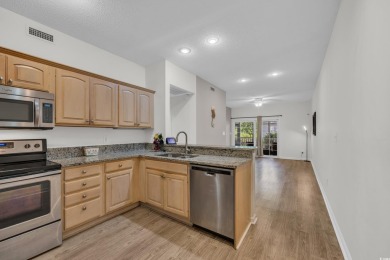 Enjoy easy coastal living in this beautifully updated 2-bedroom on Indian Wells Golf Course in South Carolina - for sale on GolfHomes.com, golf home, golf lot